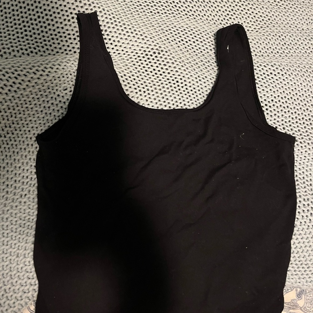 TWIK black body suit